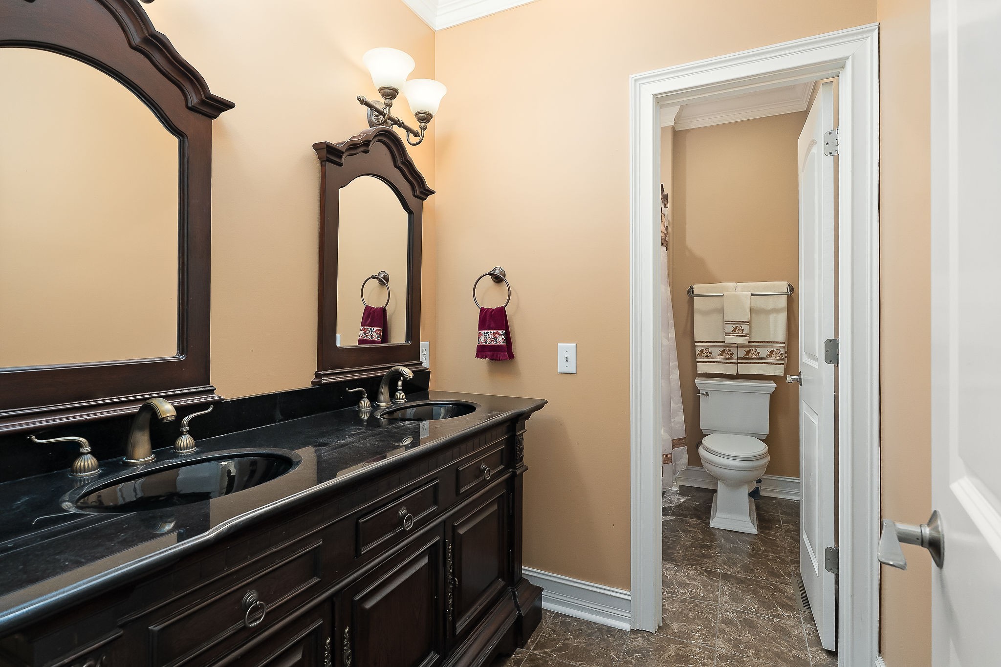 120 Dunrobin Court Sparta, TN 38583 - Photo 25 of 42 a bathroom with a double vanity sink and a mirror