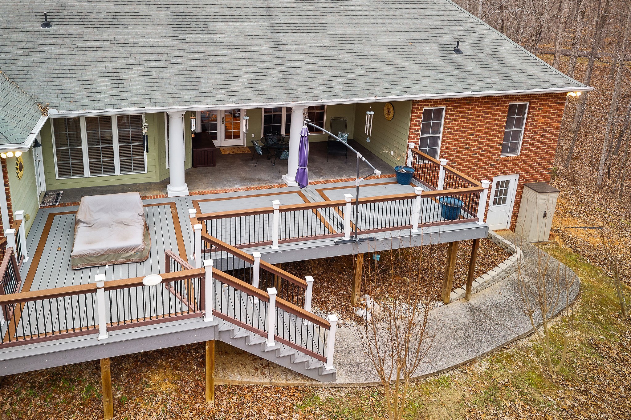 120 Dunrobin Court Sparta, TN 38583 - Photo 33 of 42 a view of a house with backyard and deck