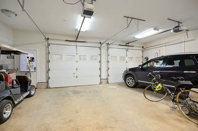 a view of parking garage with cars