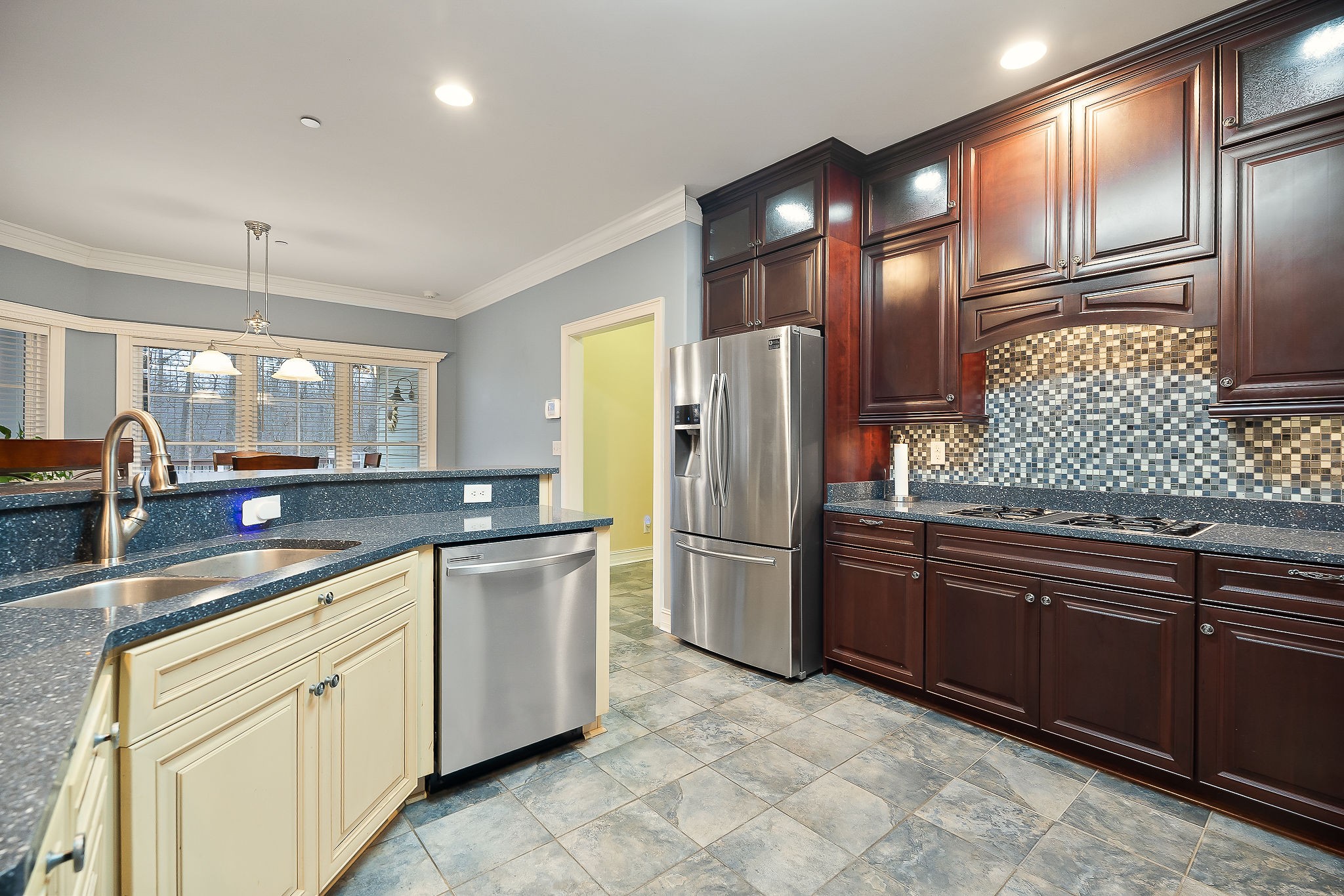 120 Dunrobin Court Sparta, TN 38583 - Photo 7 of 42 a kitchen with stainless steel appliances granite countertop a refrigerator and a sink