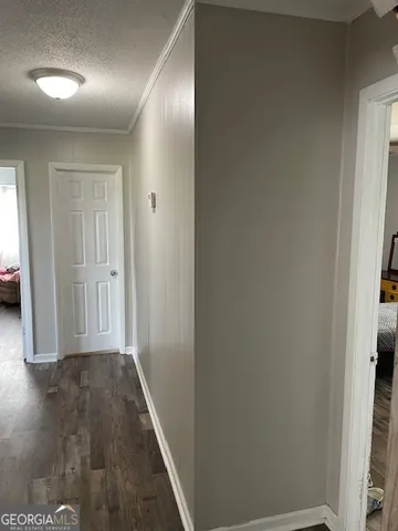 a bathroom with a tub shower vanity and a sink