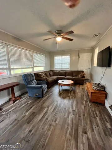 a bathroom with a bathtub and a toilet