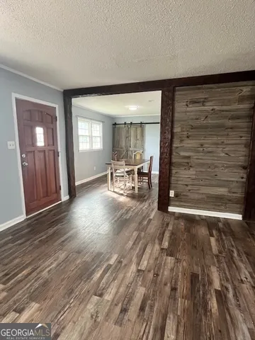 wooden floor in a hall with an entryway