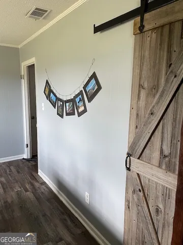 a view of a hallway with staircase