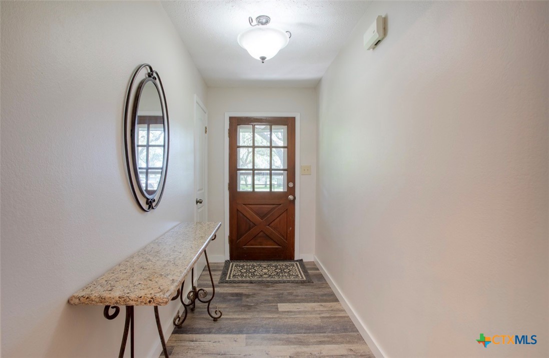 188 Cavalry Road Victoria, TX 77905 - Photo 12 of 30 a view of an entryway with wooden floor