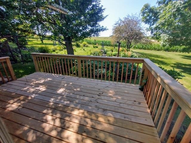 9101 North Church Road Davis, IL 61019 - Photo 11 of 38 a view of a wooden deck