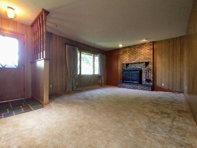 9101 North Church Road Davis, IL 61019 - Photo 7 of 38 an empty room with windows fireplace and sink