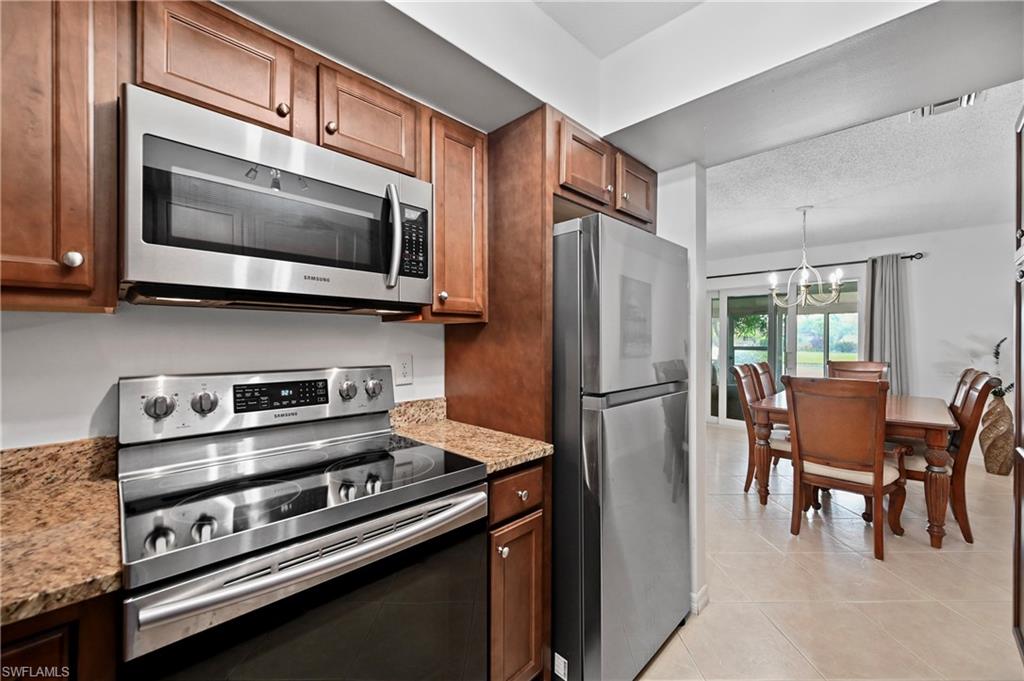146 Harrison Road, Unit K1 Naples, FL 34112 - Photo 18 of 44 Stainless and granite