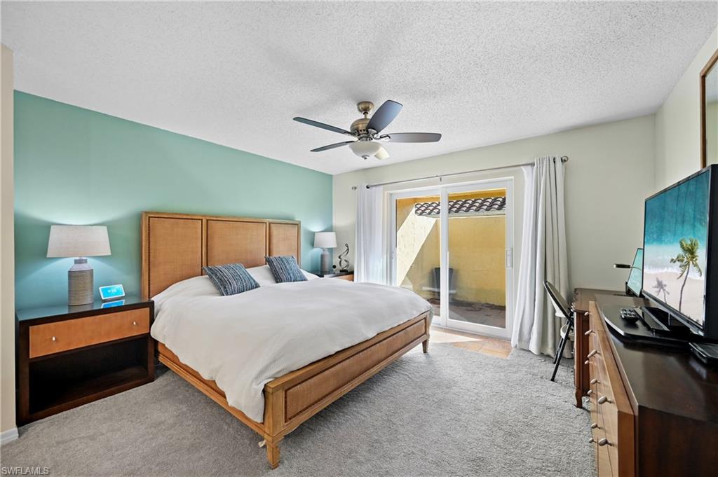 146 Harrison Road, Unit K1 Naples, FL 34112 - Photo 27 of 44 Master Bedroom