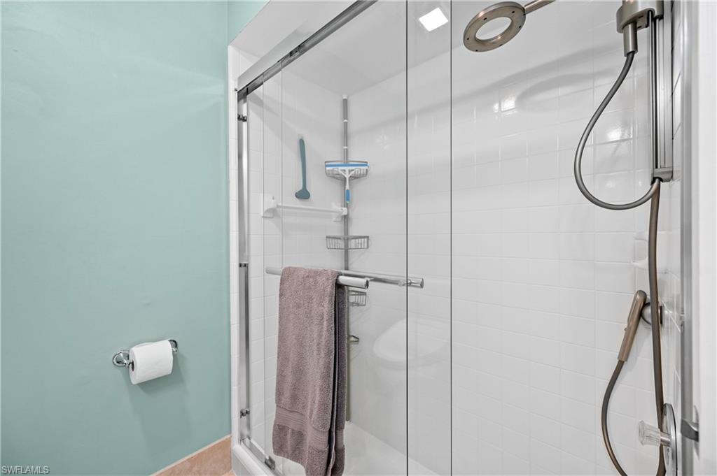 146 Harrison Road, Unit K1 Naples, FL 34112 - Photo 30 of 44 Master shower white tile