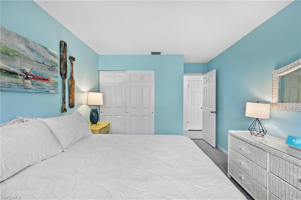 146 Harrison Road, Unit K1 Naples, FL 34112 - Photo 33 of 44 Guest bedroom
