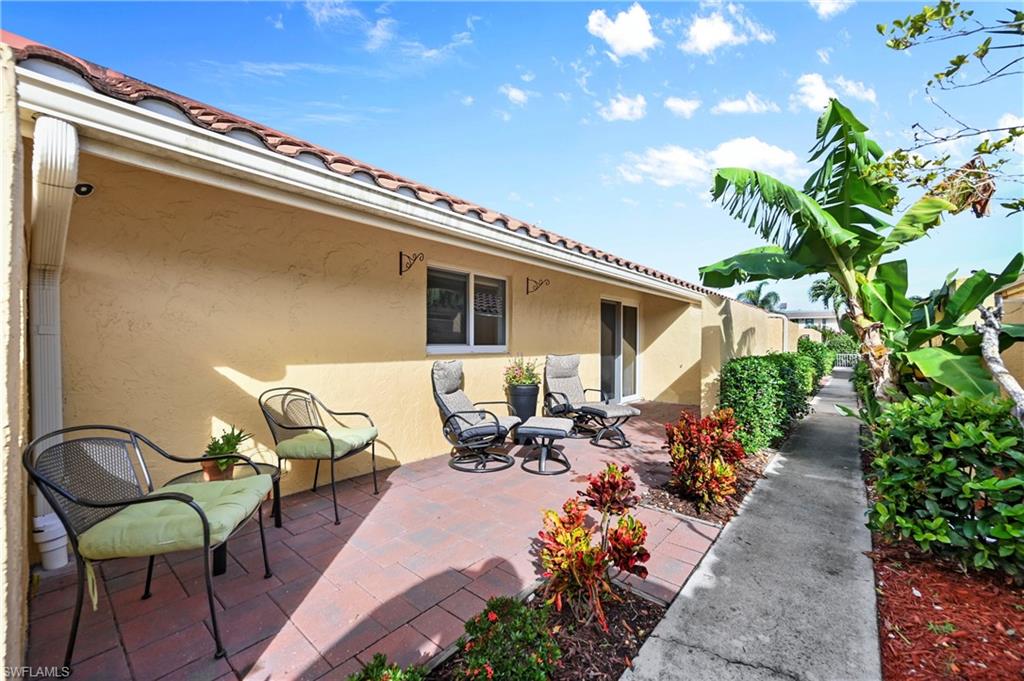 146 Harrison Road, Unit K1 Naples, FL 34112 - Photo 36 of 44 Open Lanai #2
