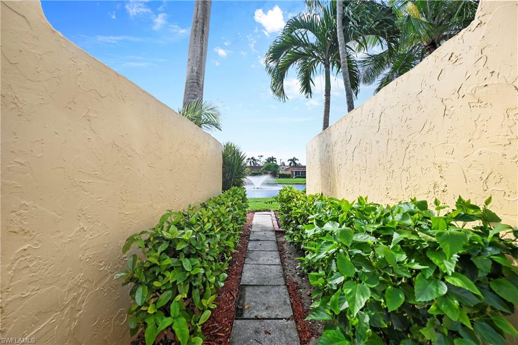 146 Harrison Road, Unit K1 Naples, FL 34112 - Photo 42 of 44 Walk way