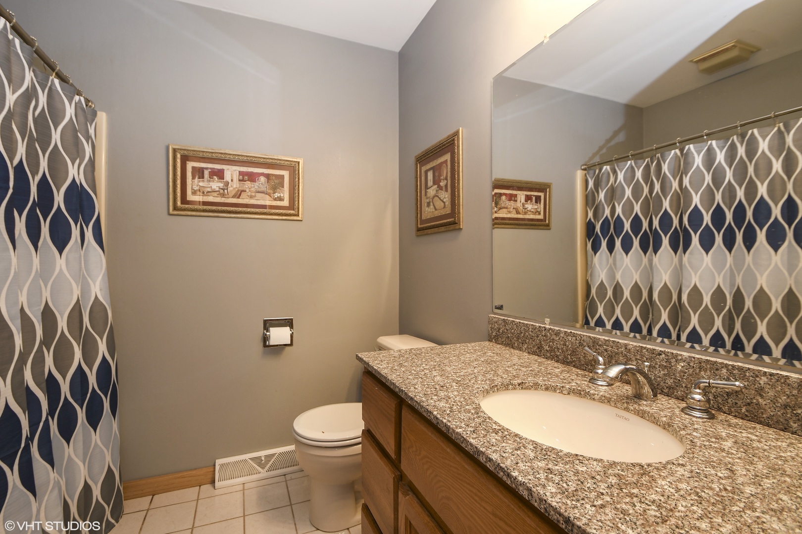 921 Barnside Road New Lenox, IL 60451 - Photo 18 of 27 a bathroom with a granite countertop toilet and a sink