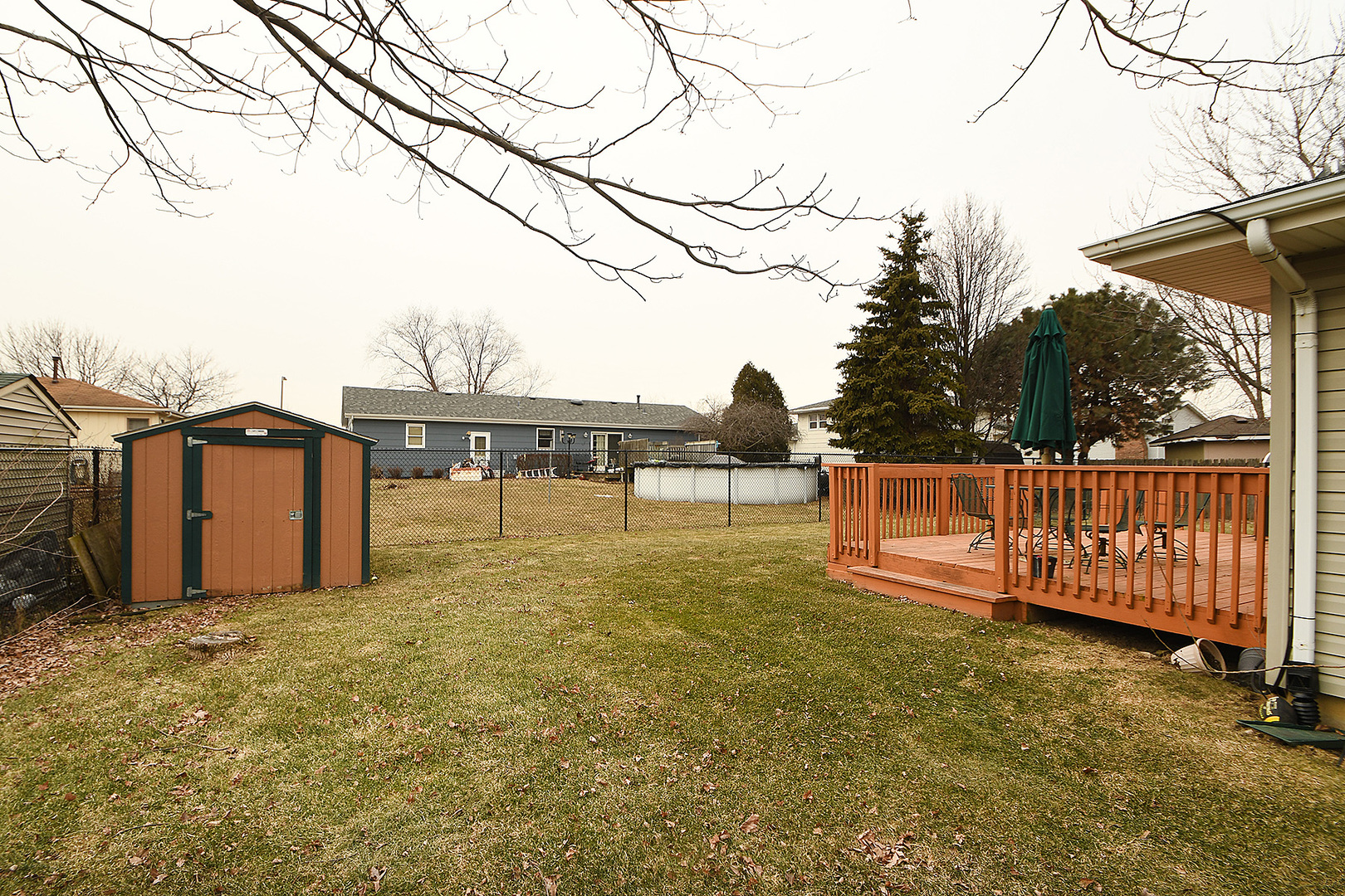 921 Barnside Road New Lenox, IL 60451 - Photo 23 of 27 a view of a yard with wooden fence