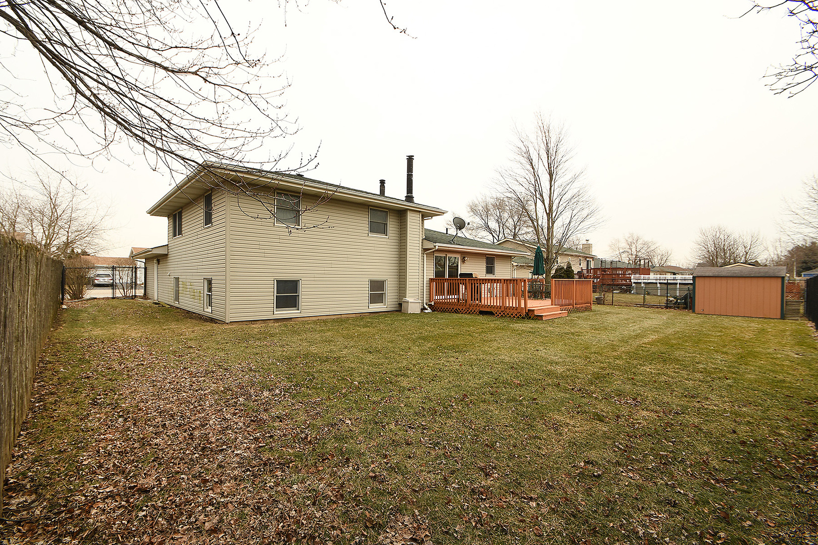 921 Barnside Road New Lenox, IL 60451 - Photo 26 of 27 a view of a backyard with a garden
