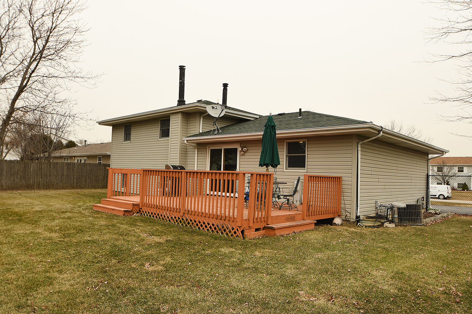921 Barnside Road New Lenox, IL 60451 - Photo 27 of 27 a view of a house with wooden fence