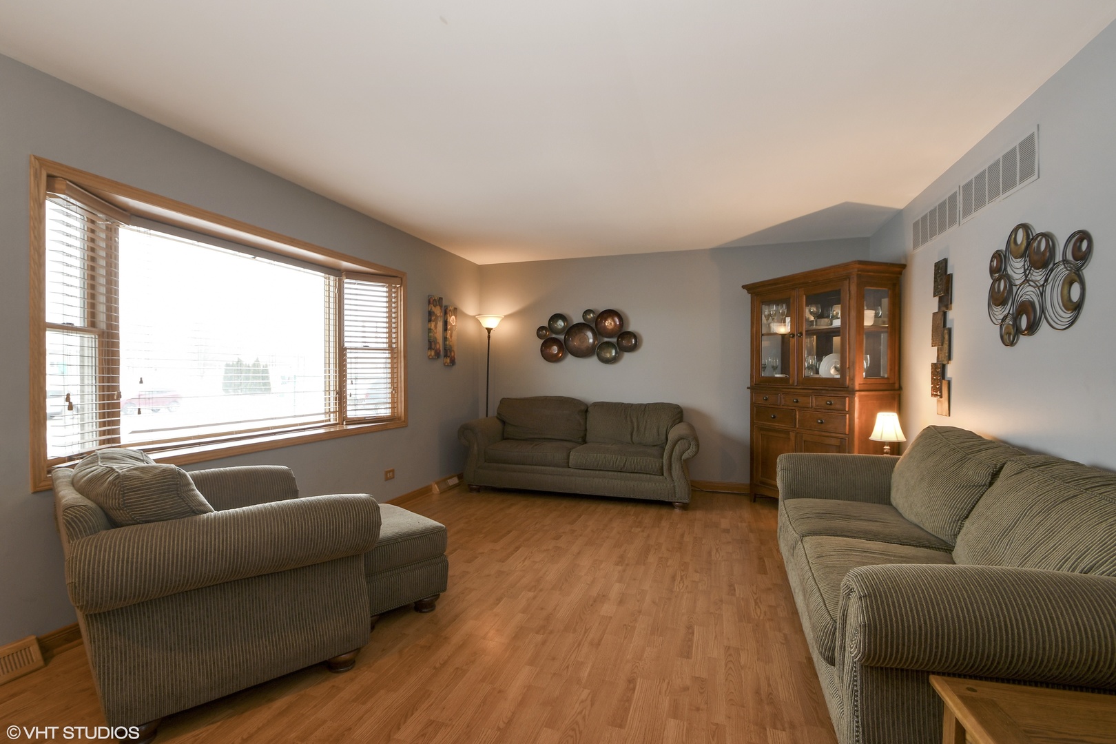 921 Barnside Road New Lenox, IL 60451 - Photo 4 of 27 a living room with furniture and a large window