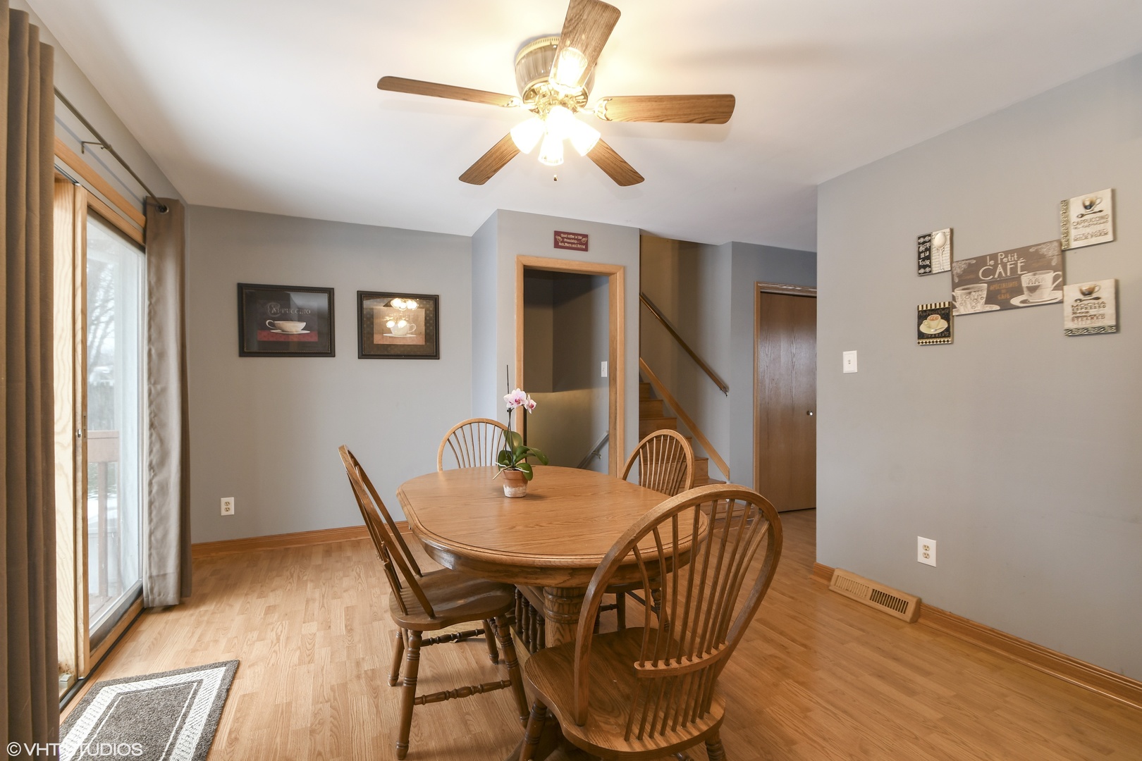 921 Barnside Road New Lenox, IL 60451 - Photo 8 of 27 a view of a dining room with furniture window and wooden floor