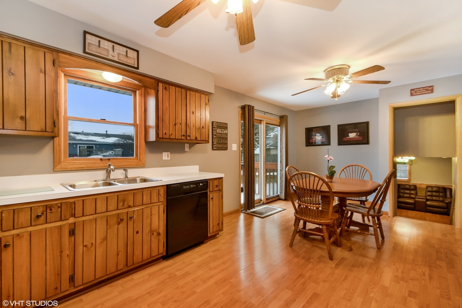 921 Barnside Road New Lenox, IL 60451 - Photo 10 of 27 a view of a dining room with furniture window and wooden floor