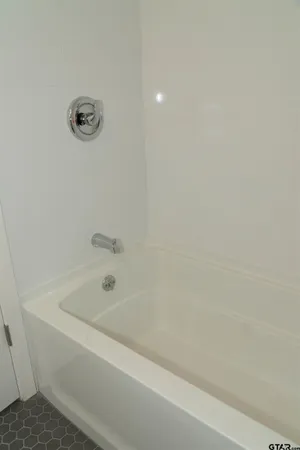 a bathroom with a bathtub