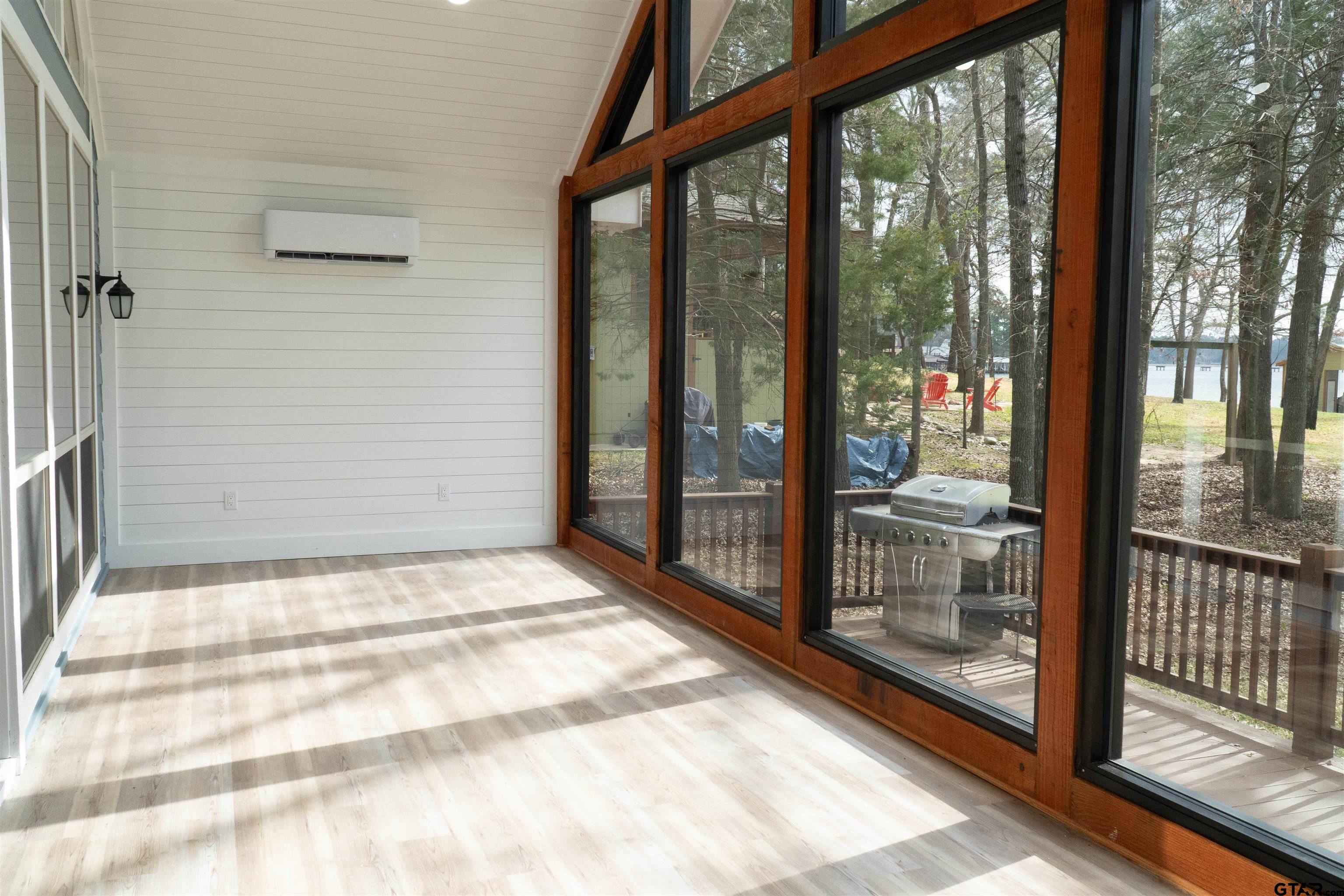 224 Miller Road Scroggins, TX 75480 - Photo 17 of 24 a view of a glass door with a glass door