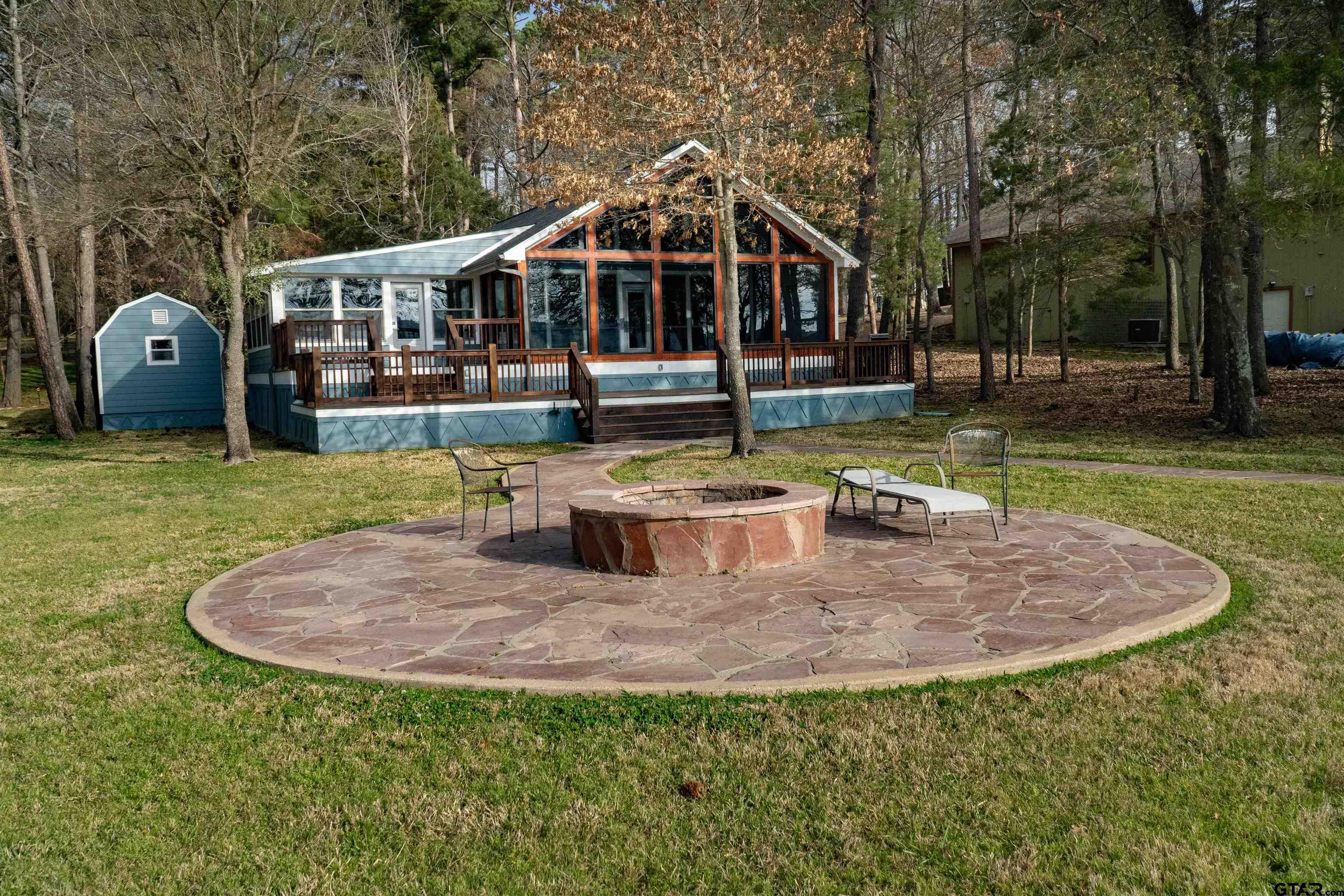 224 Miller Road Scroggins, TX 75480 - Photo 21 of 24 a front view of a house with swimming pool