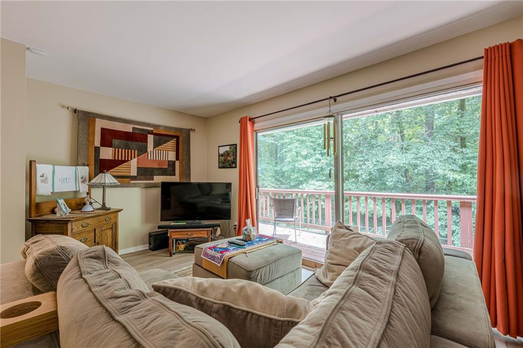 3671 Cold Spring Lane Atlanta, GA 30341 - Photo 11 of 26 a living room with furniture and a flat screen tv