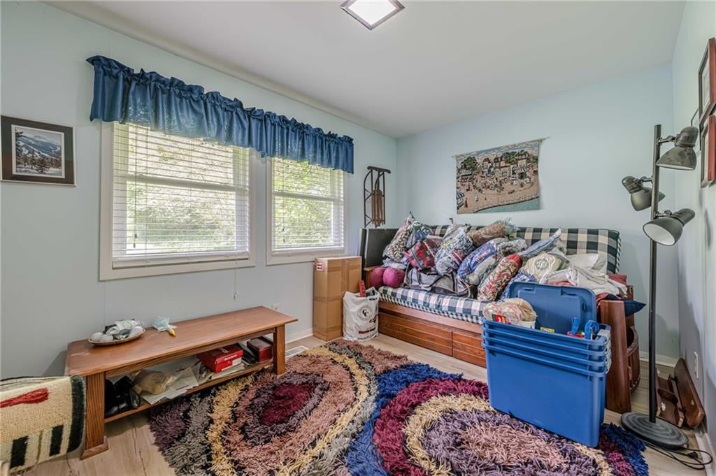 3671 Cold Spring Lane Atlanta, GA 30341 - Photo 15 of 26 a bed room with a bed and a window