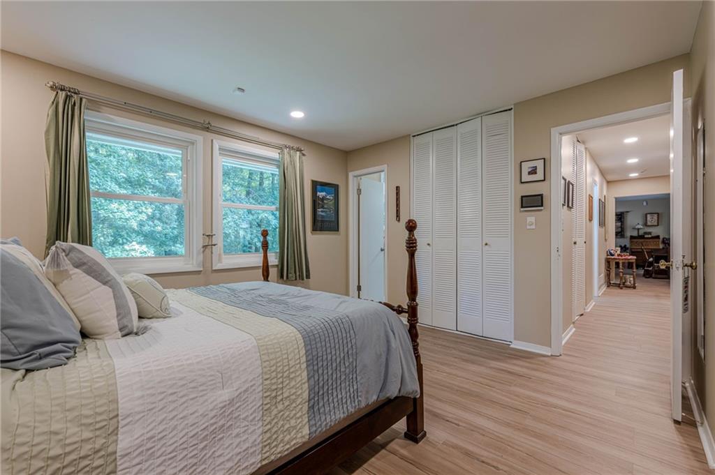 3671 Cold Spring Lane Atlanta, GA 30341 - Photo 17 of 26 a bedroom with a bed and a large window