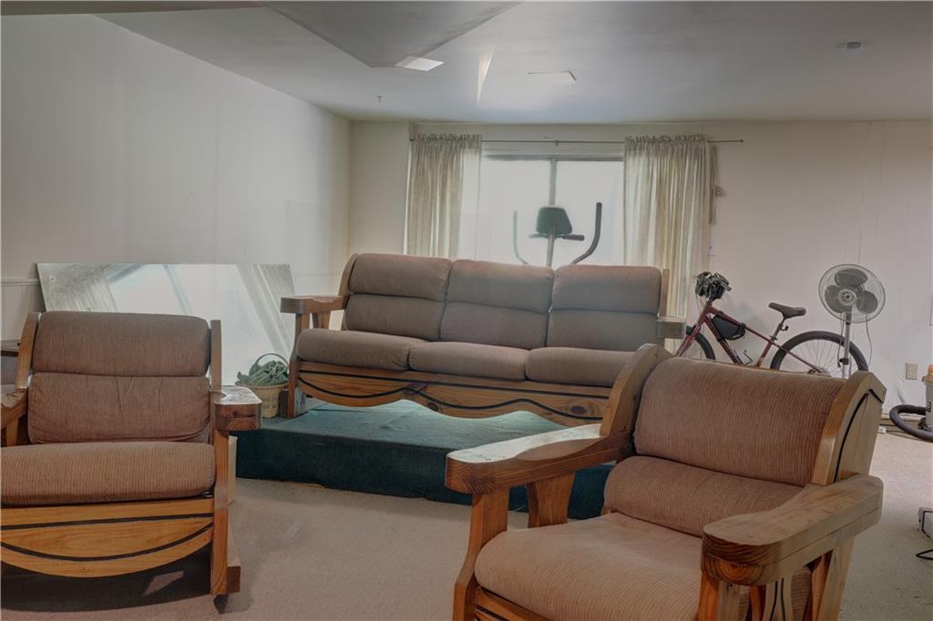 3671 Cold Spring Lane Atlanta, GA 30341 - Photo 20 of 26 a living room with furniture a couch and a potted plant