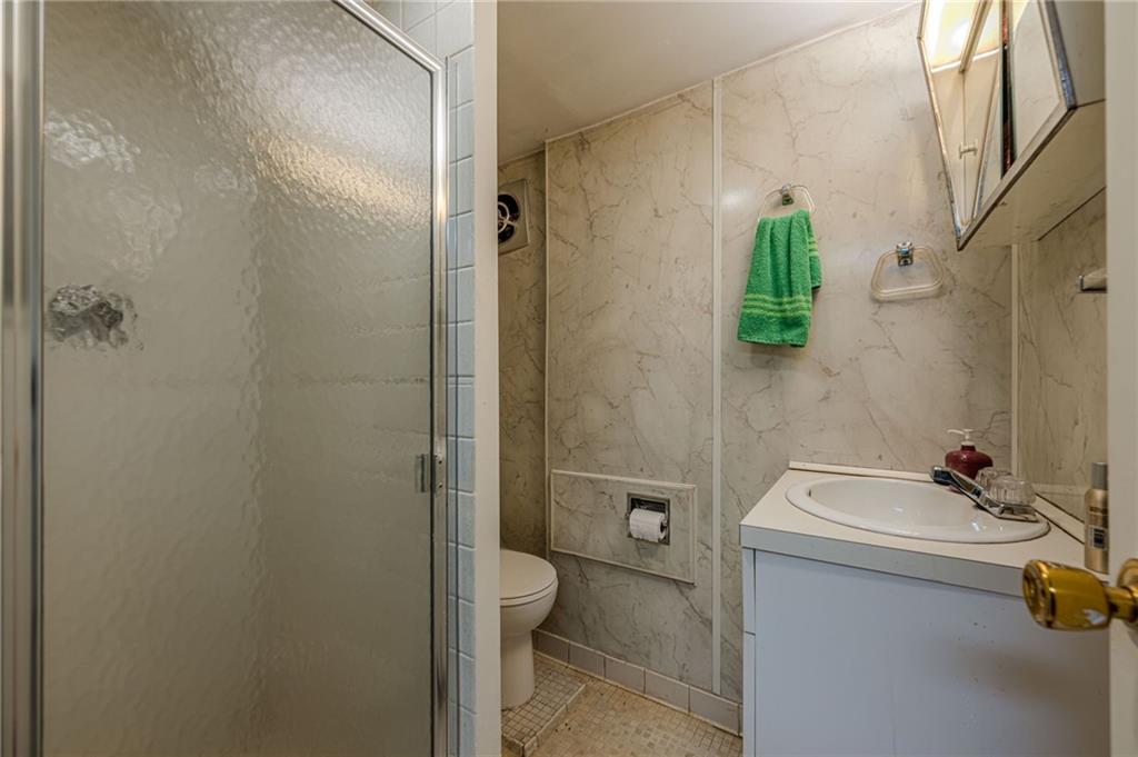 3671 Cold Spring Lane Atlanta, GA 30341 - Photo 21 of 26 a bathroom with a sink a toilet and shower