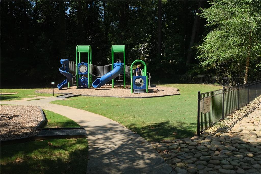 3671 Cold Spring Lane Atlanta, GA 30341 - Photo 25 of 26 a view of a park with swings