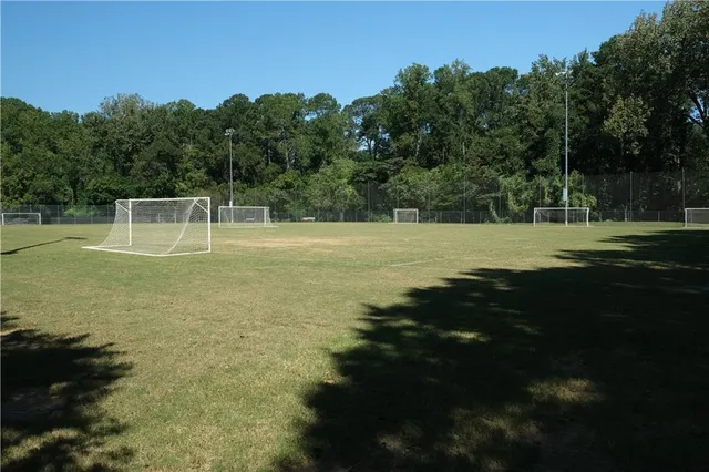 a view of outdoor space with deck and yard