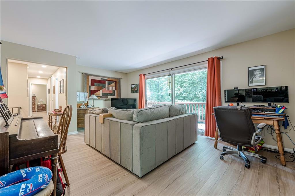 3671 Cold Spring Lane Atlanta, GA 30341 - Photo 9 of 26 a living room with furniture and a window