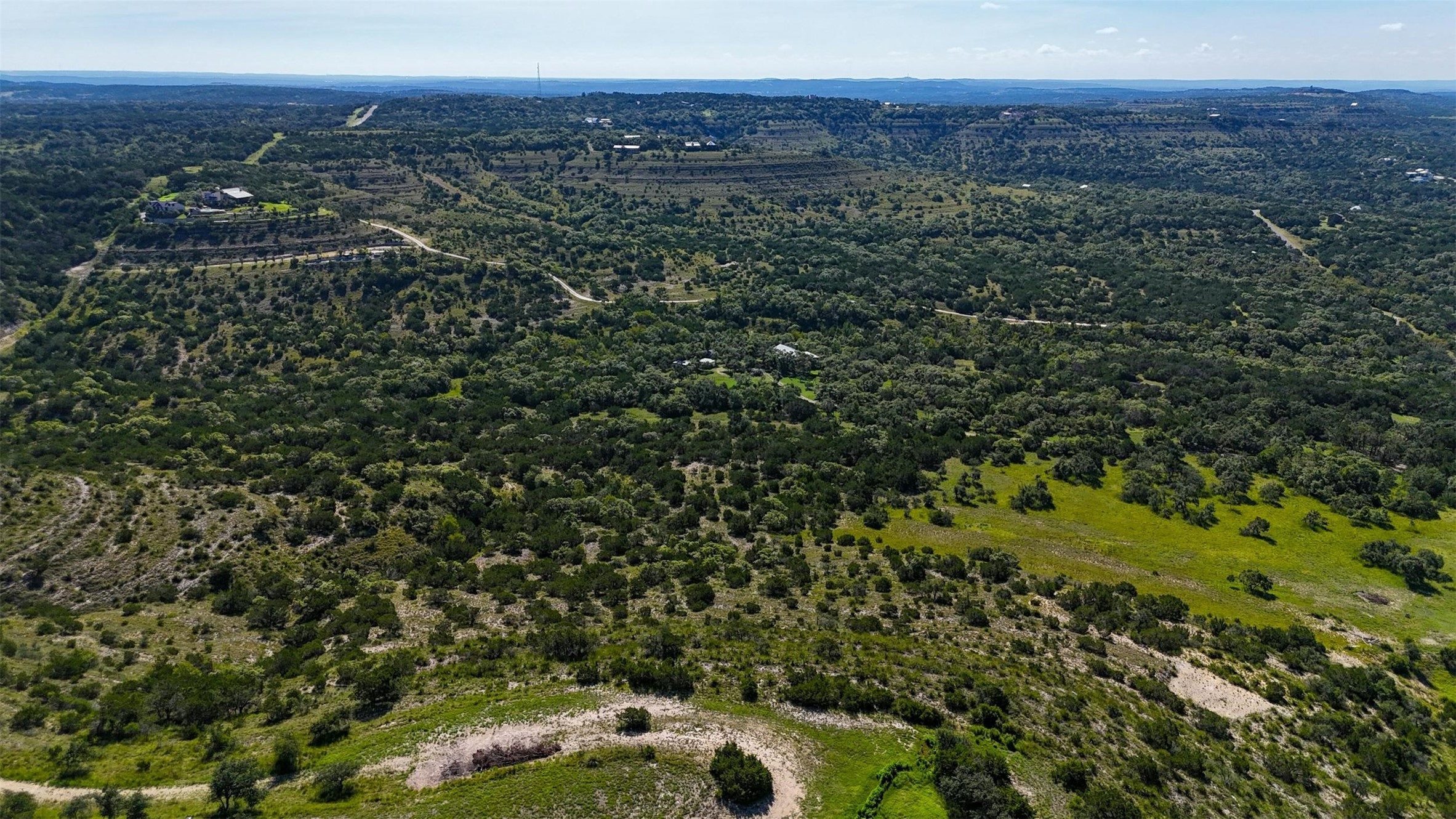 1215 Montell Road Wimberley, TX 78676 - Photo 28 of 38 a view of a green field