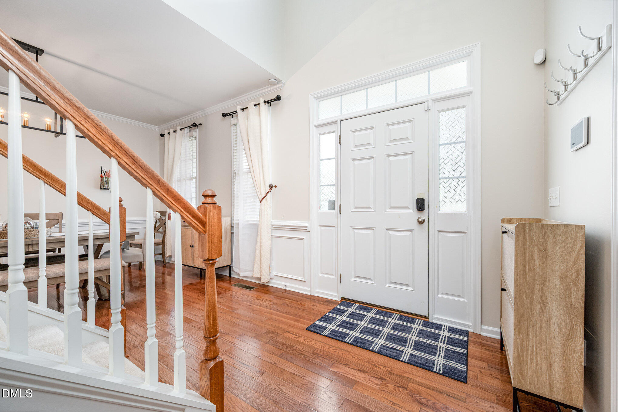 2116 Covered Bridge Court Raleigh, NC 27614 - Photo 6 of 36 a view of a hallway with wooden floor and entryway