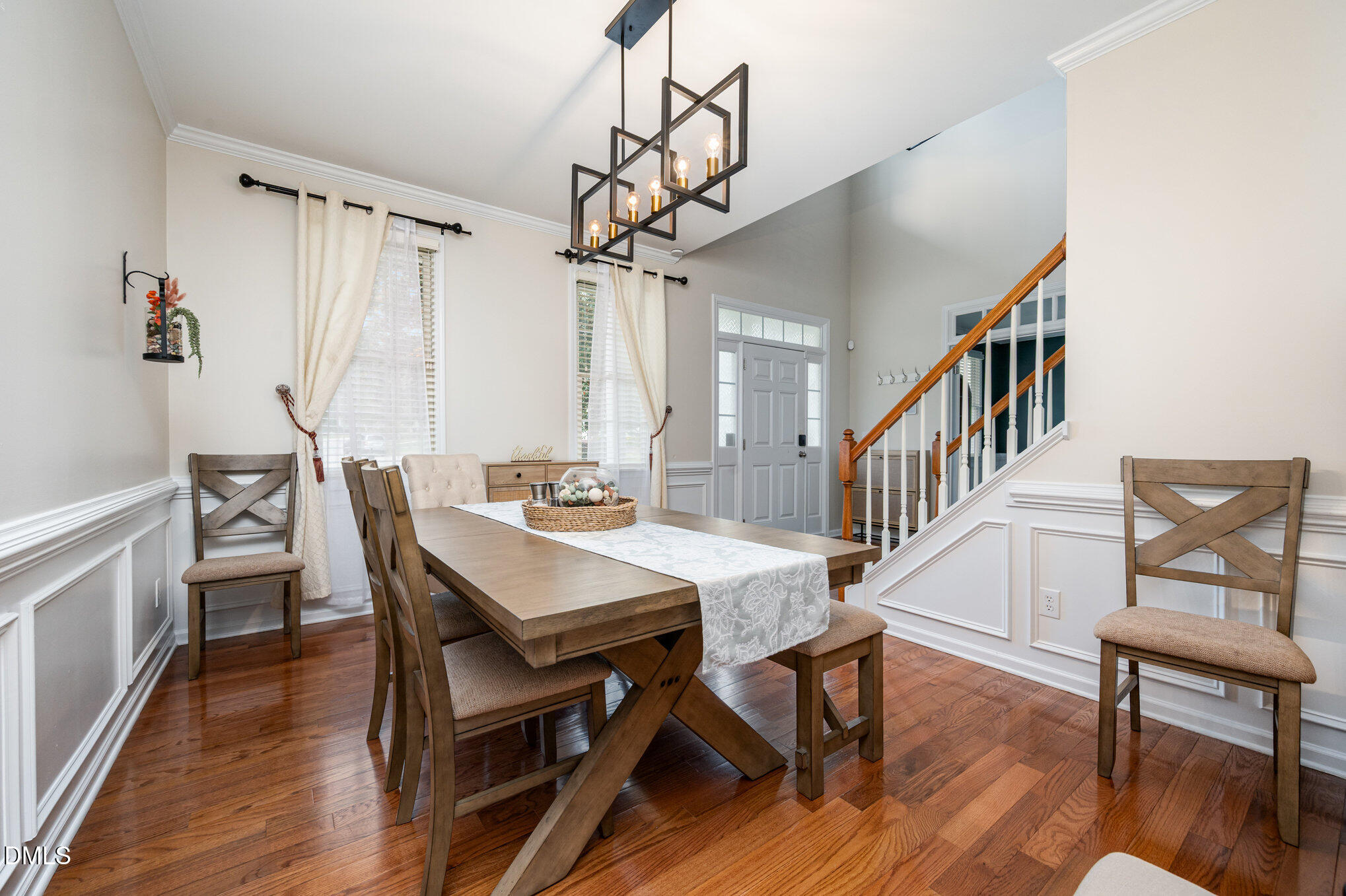 2116 Covered Bridge Court Raleigh, NC 27614 - Photo 10 of 36 a view of a dining room with furniture window and wooden floor