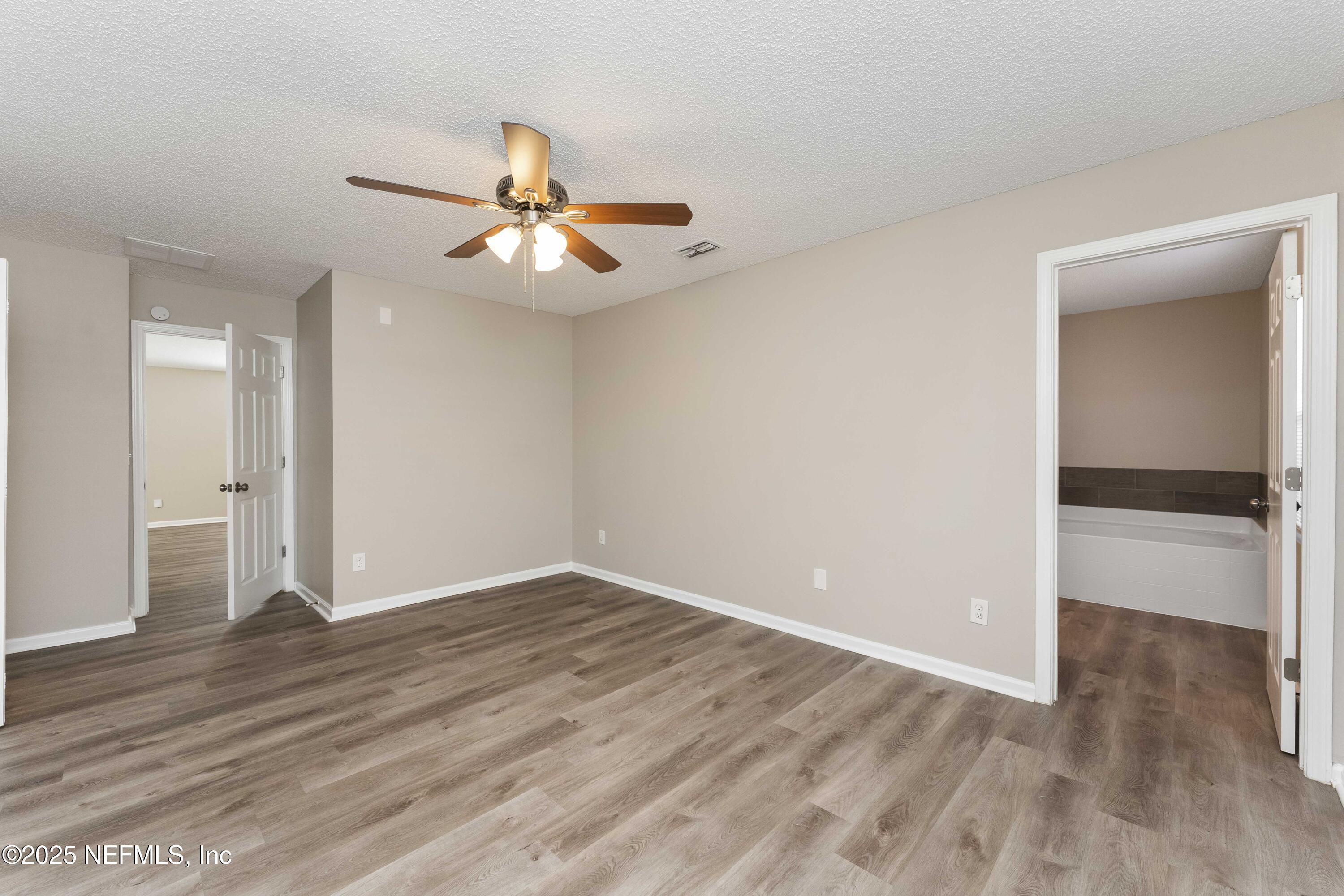 8625 Star Leaf Road North Jacksonville, FL 32210 - Photo 12 of 25 12_Primary Bedroom