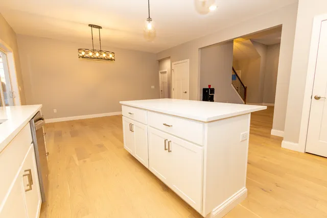 a view of a kitchen with a sink
