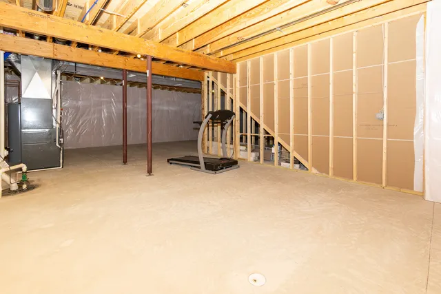 a view of a room with wooden walls