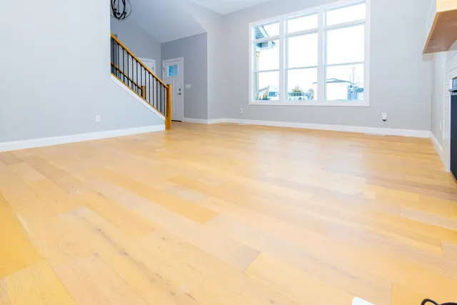 an empty room with windows