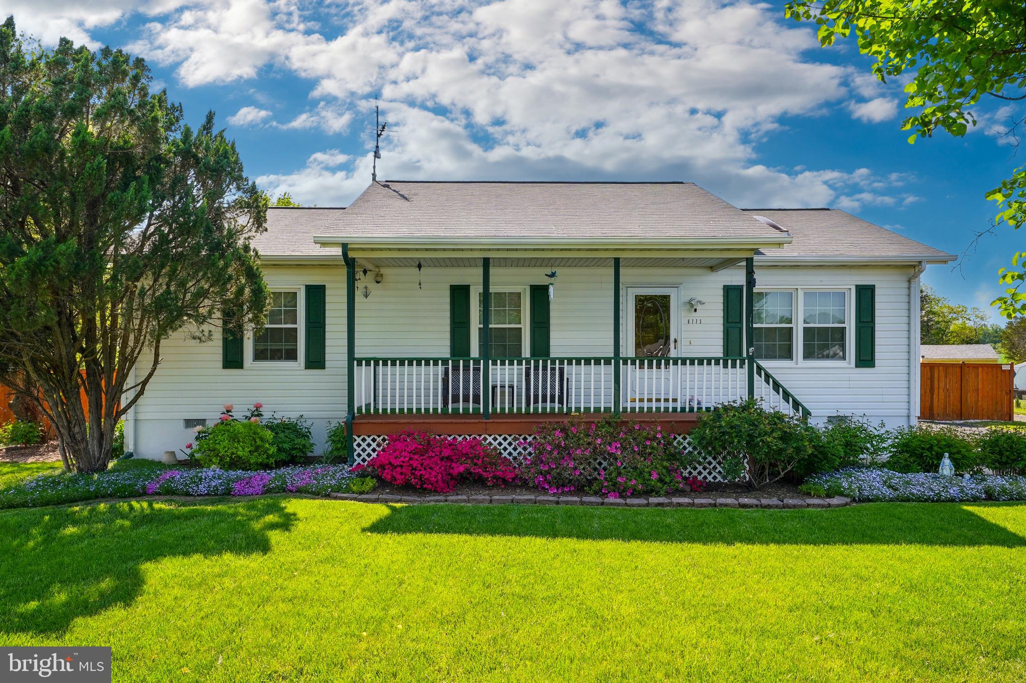 6775 Rugby Place Bealeton, VA 22712 - Photo 1 of 43 a front view of a house with garden