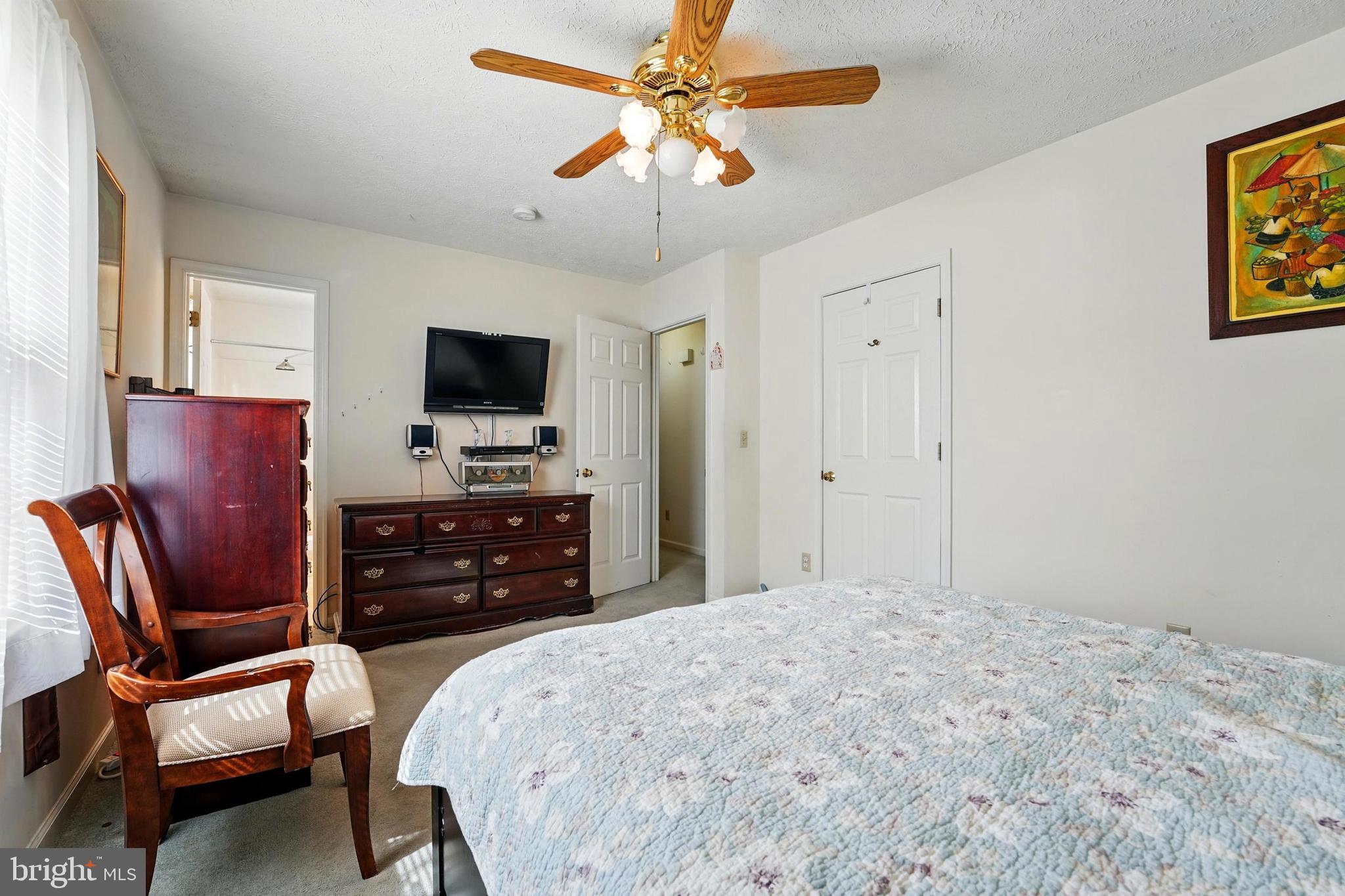 6775 Rugby Place Bealeton, VA 22712 - Photo 23 of 43 a bedroom with a bed and a television