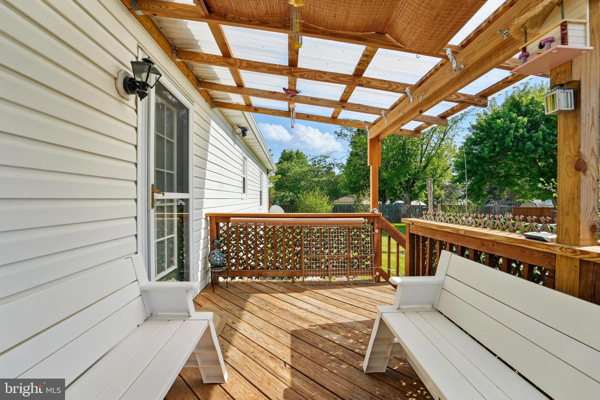 6775 Rugby Place Bealeton, VA 22712 - Photo 27 of 43 a view of balcony with wooden floor and outdoor seating