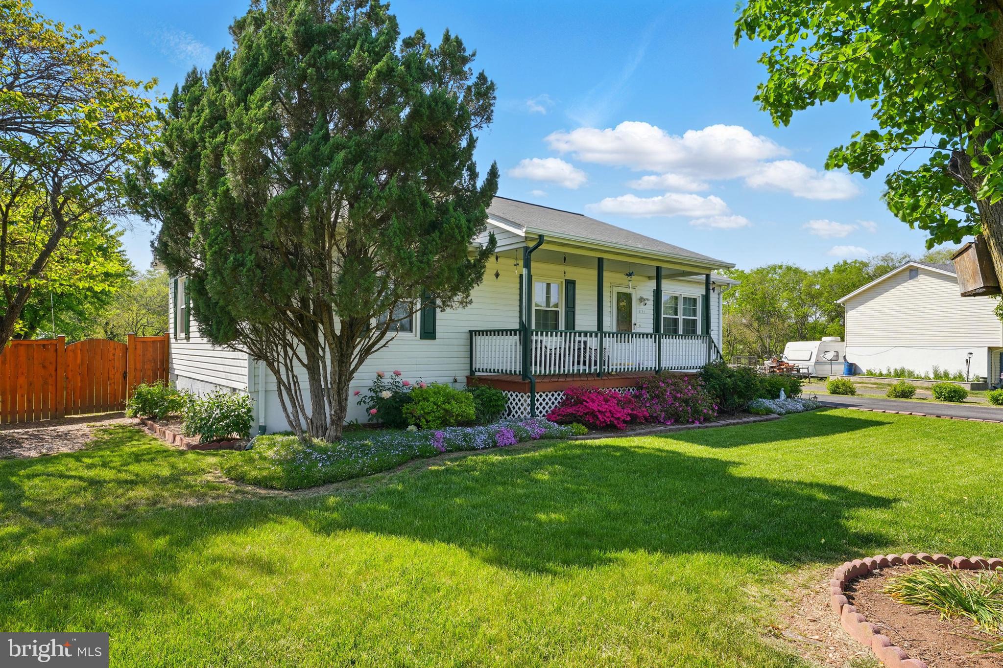 6775 Rugby Place Bealeton, VA 22712 - Photo 3 of 43 a view of green field with house in the background