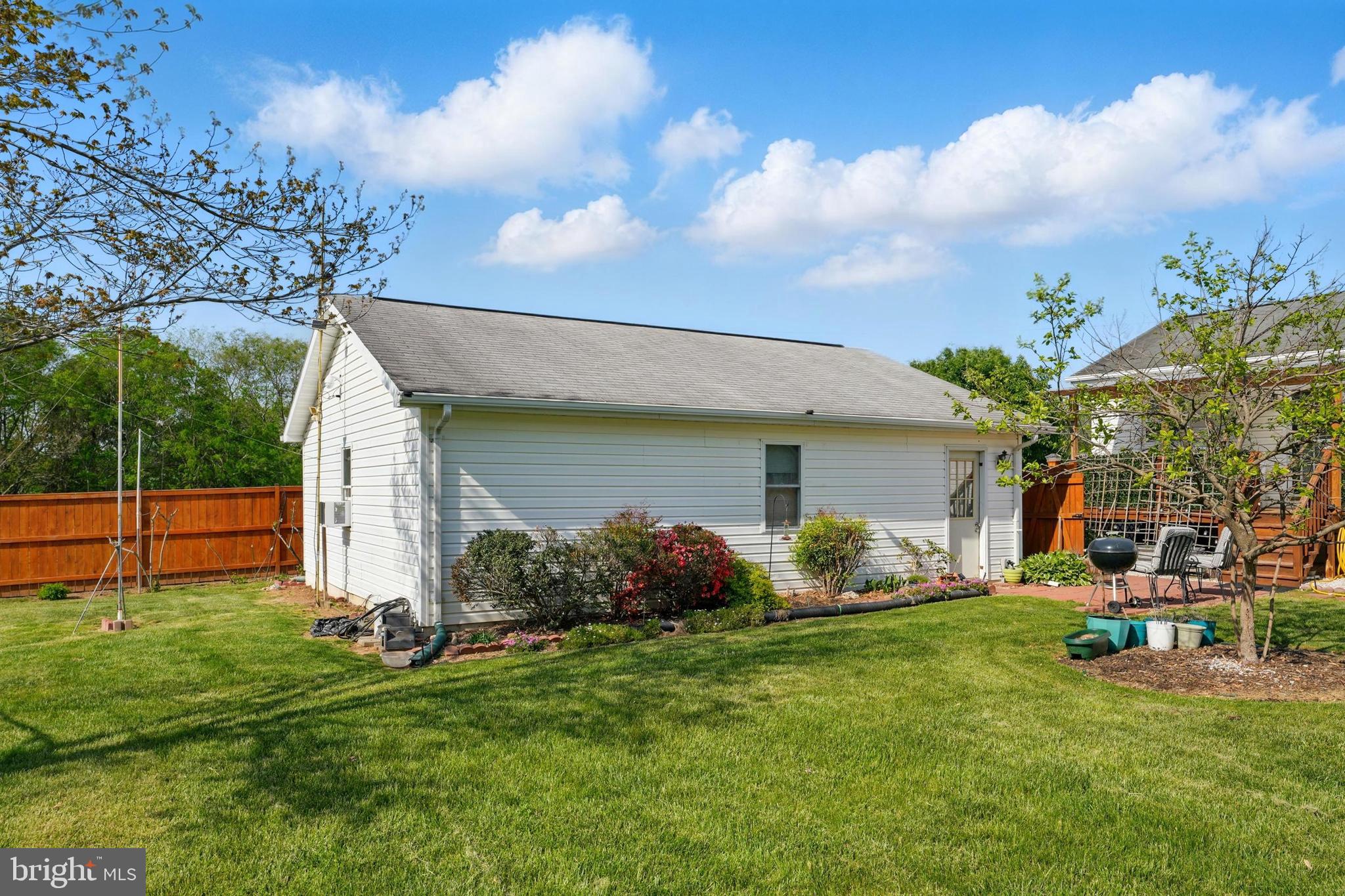 6775 Rugby Place Bealeton, VA 22712 - Photo 31 of 43 a front view of a house with garden