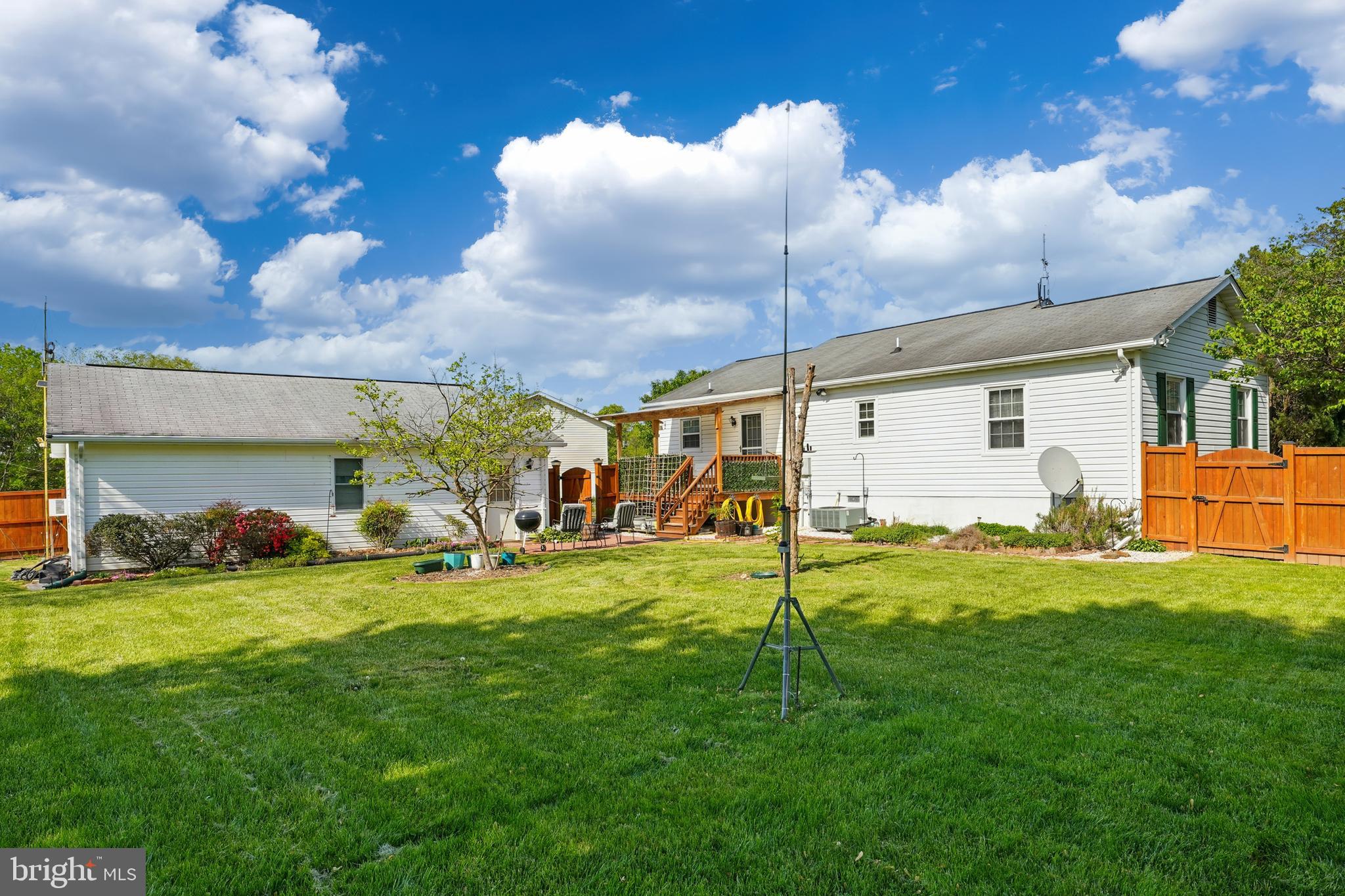 6775 Rugby Place Bealeton, VA 22712 - Photo 33 of 43 a view of a backyard of the house