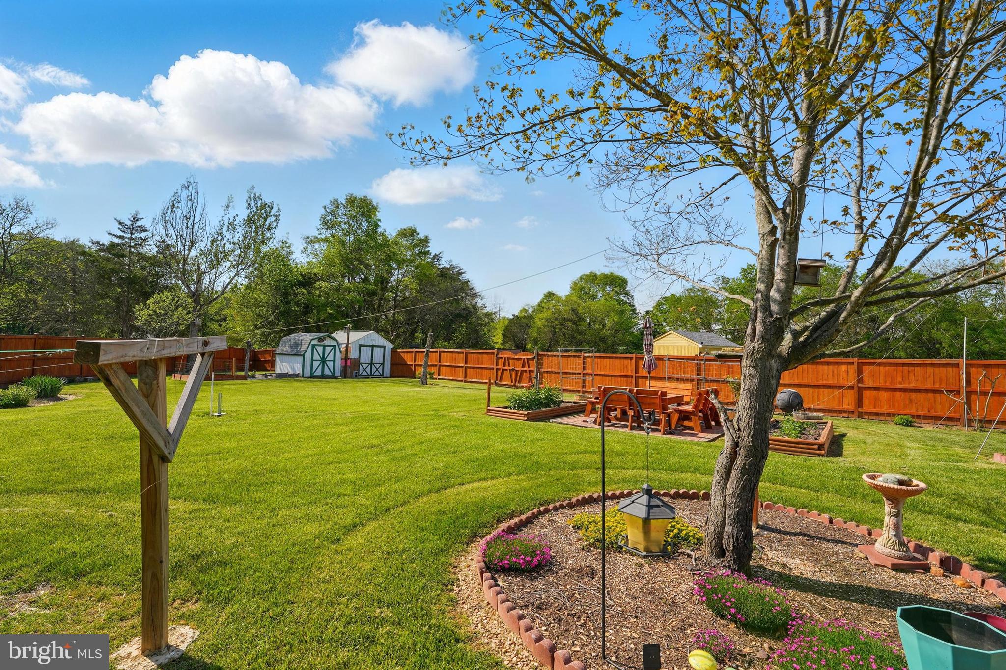 6775 Rugby Place Bealeton, VA 22712 - Photo 36 of 43 a view of a golf course with a lake view