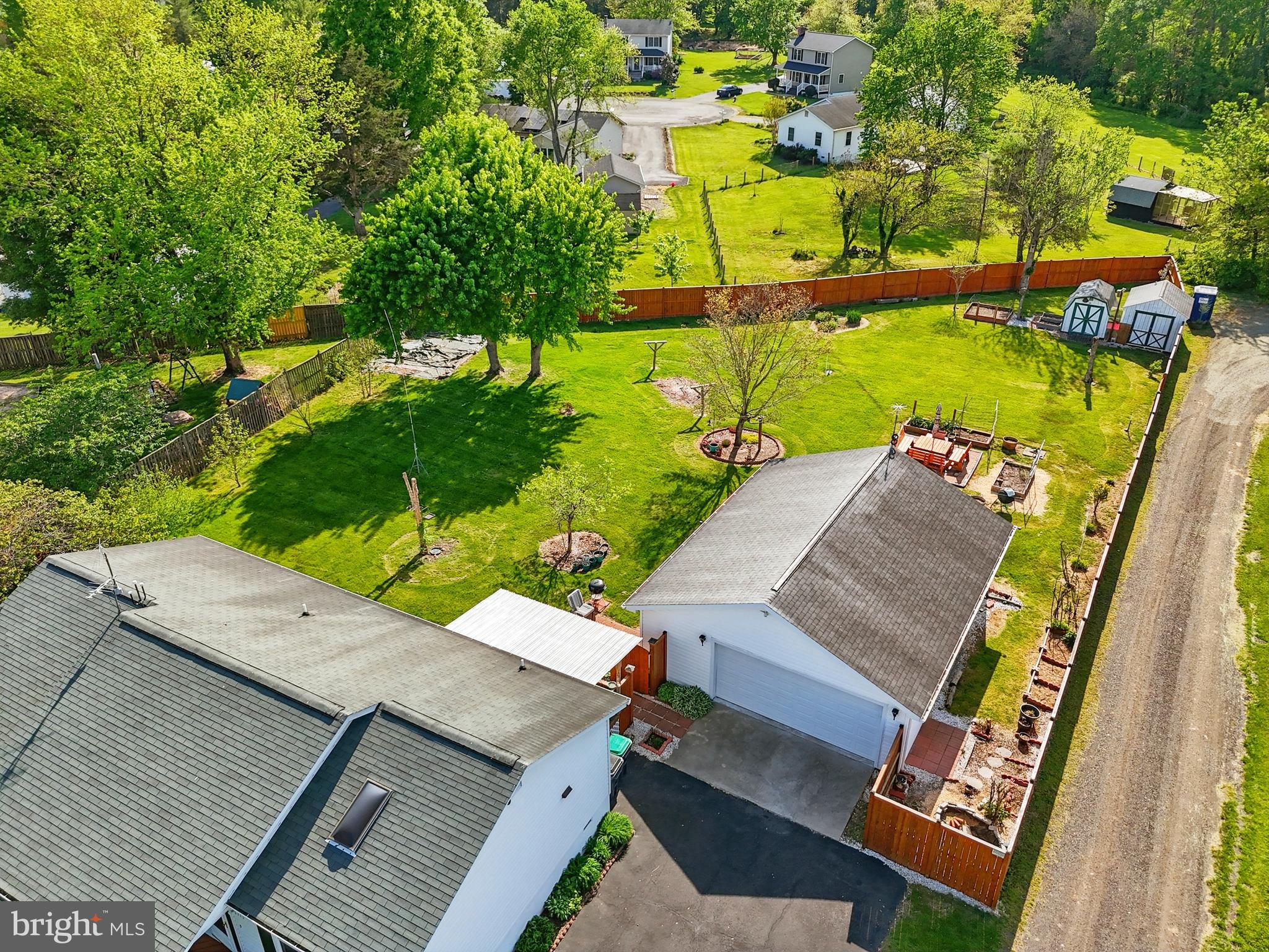 6775 Rugby Place Bealeton, VA 22712 - Photo 39 of 43 an aerial view of a house with a garden